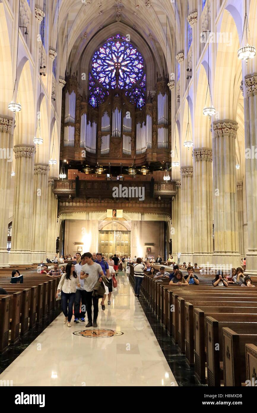 The nave and organ of St. Patrick`s Cathedral. The St. Patrick's Cathedral in New York is the largest cathedral in the United States. It is located in Manhattan. Start of construction was the 15th of August 1858. It was built in neo-gothic style. Manhattan | usage worldwide Stock Photo